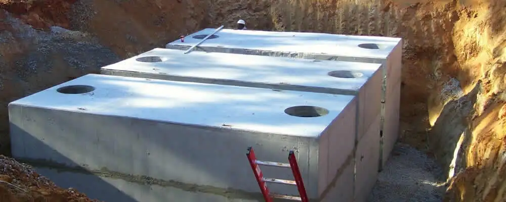 Septic tank installation site with a newly placed concrete tank in Lancaster, PA